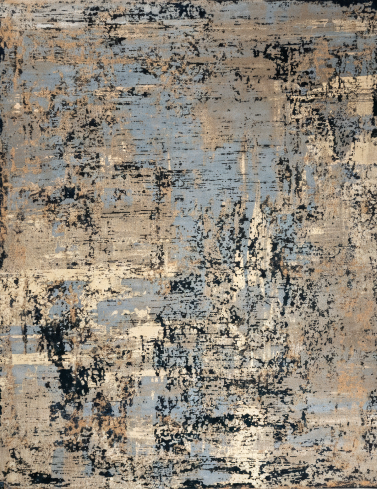 Abstract patterned rug with beige, black, and blue colors