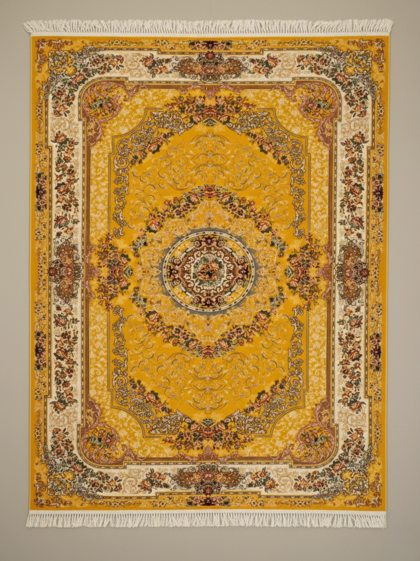 Decorative yellow rug with intricate patterns on a plain background
